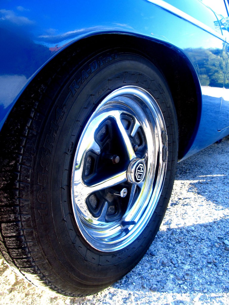 Rostyle chrome wheel close up on 1972 MG BGT