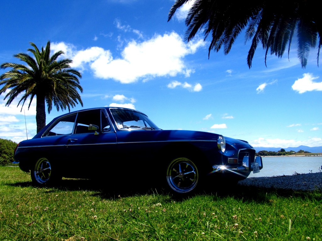 1972 MG BGT in Monaco Nelson sunshine under palm trees