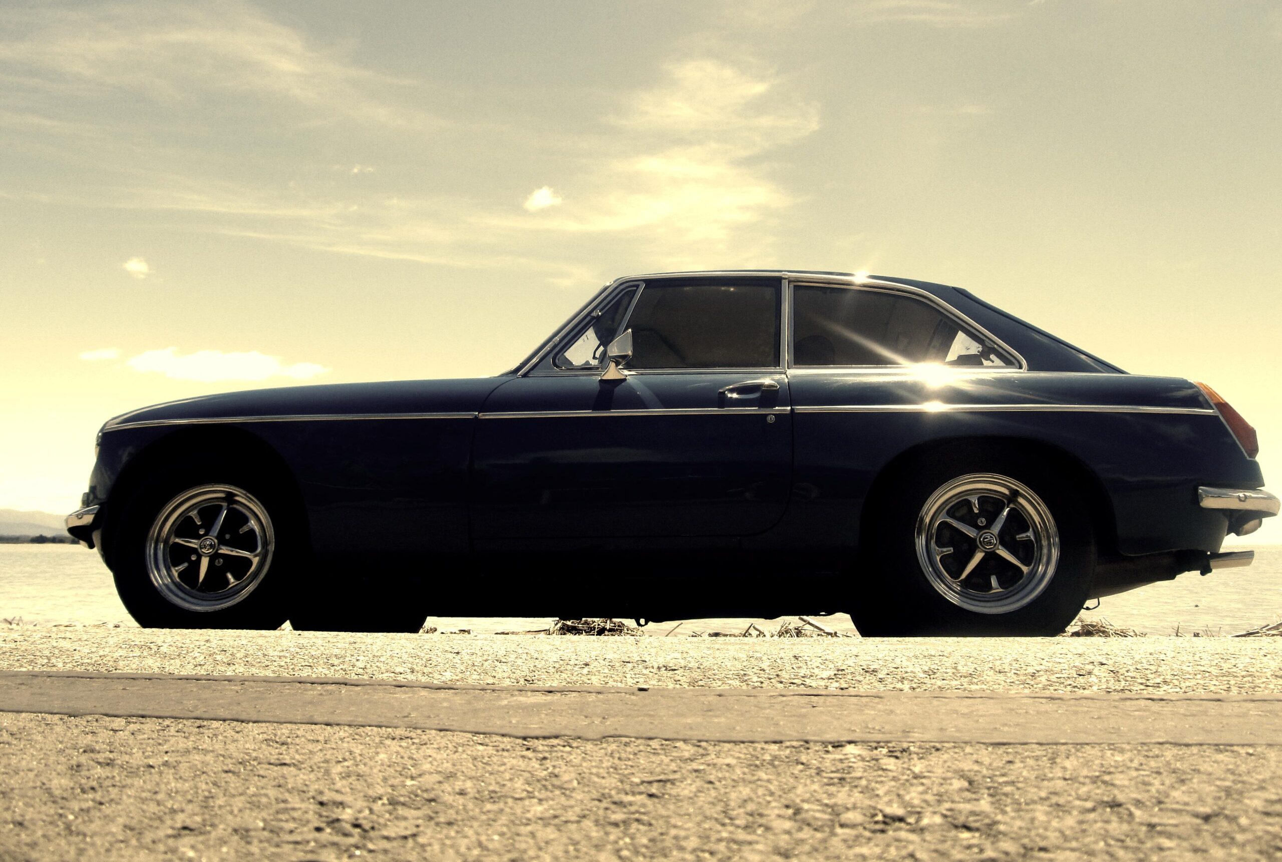 MG BGT classic sports car hire, side tinted shot, Monaco, Nelson, New Zealand