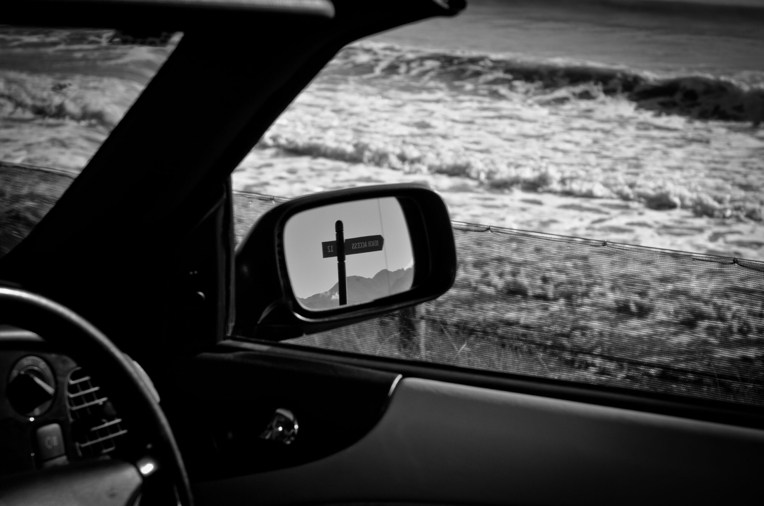 Saab Driving in New Zealand sign post