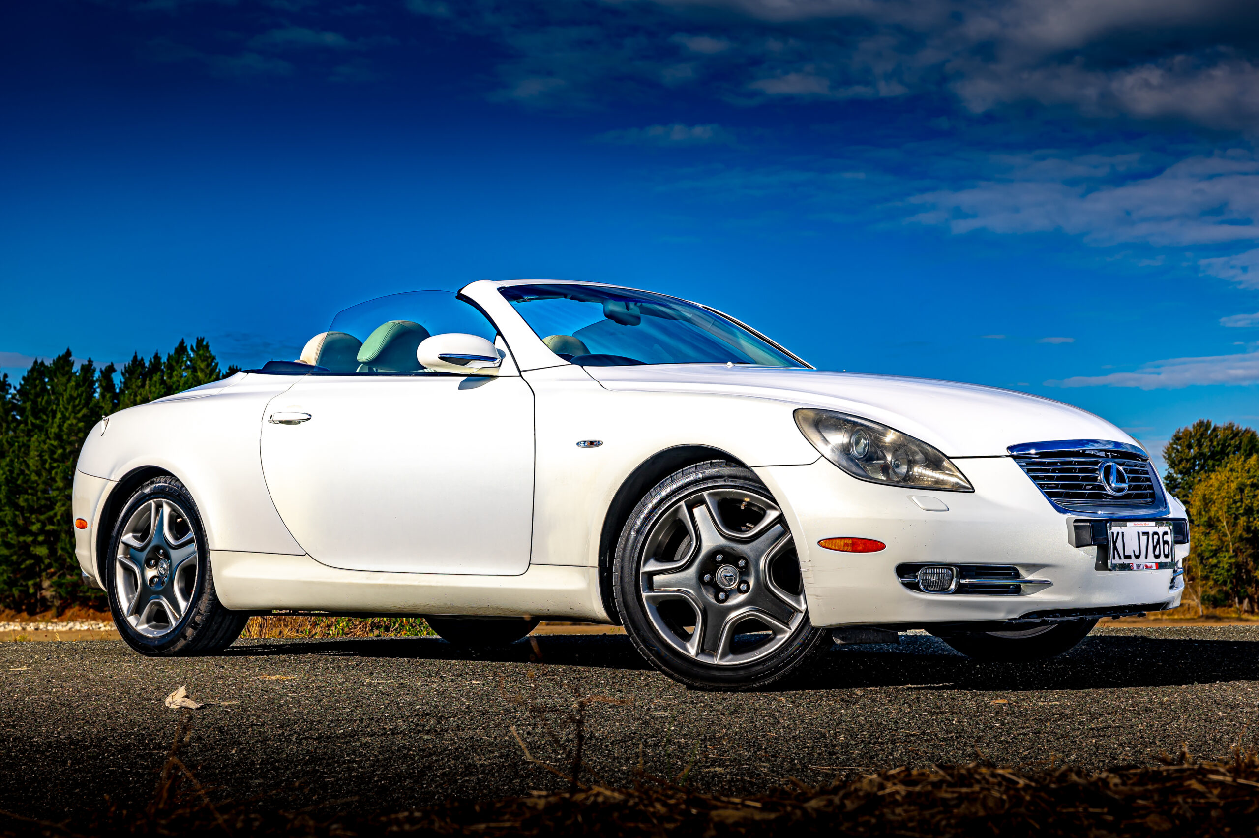 RentAClassics Lexus SC430 side on moody roof down